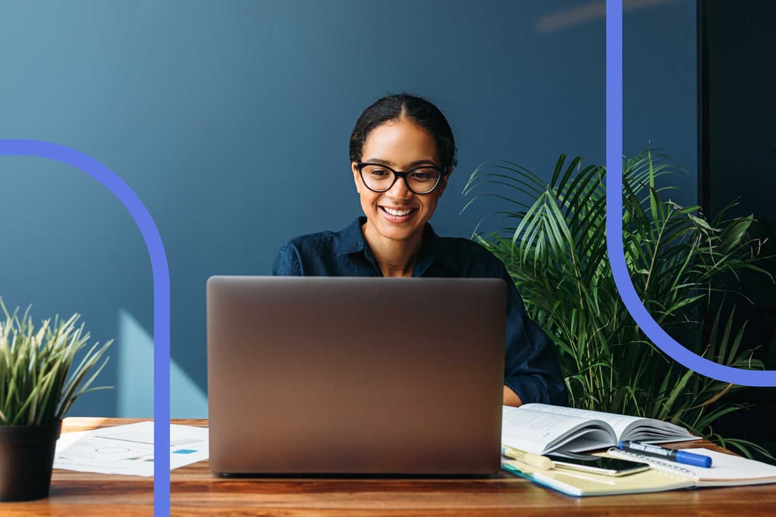 A Flxpoint teammate helping a customer from her laptop