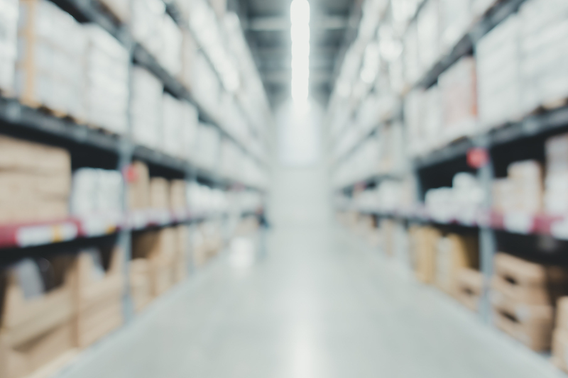 Blurred out picture of a warehouse.