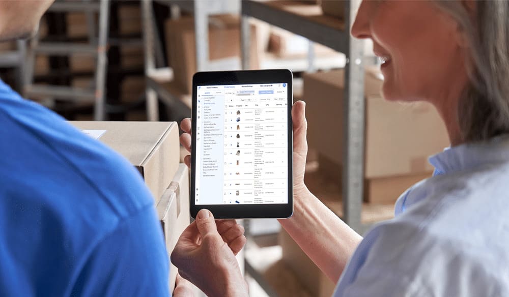 Woman holding a tablet display inventory