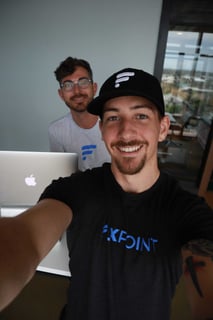 A Flxpoint teammate in a team shirt
