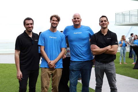 Flxpoint teammates on the lawn