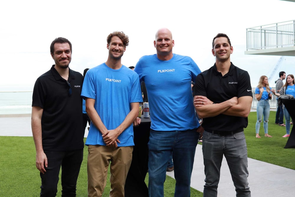 Four members of the Flxpoint team