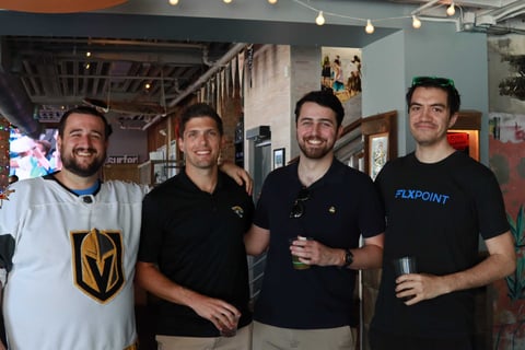 Flxpoint teammates at an event