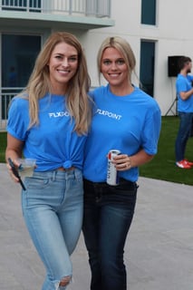Flxpoint teammates in team shirts